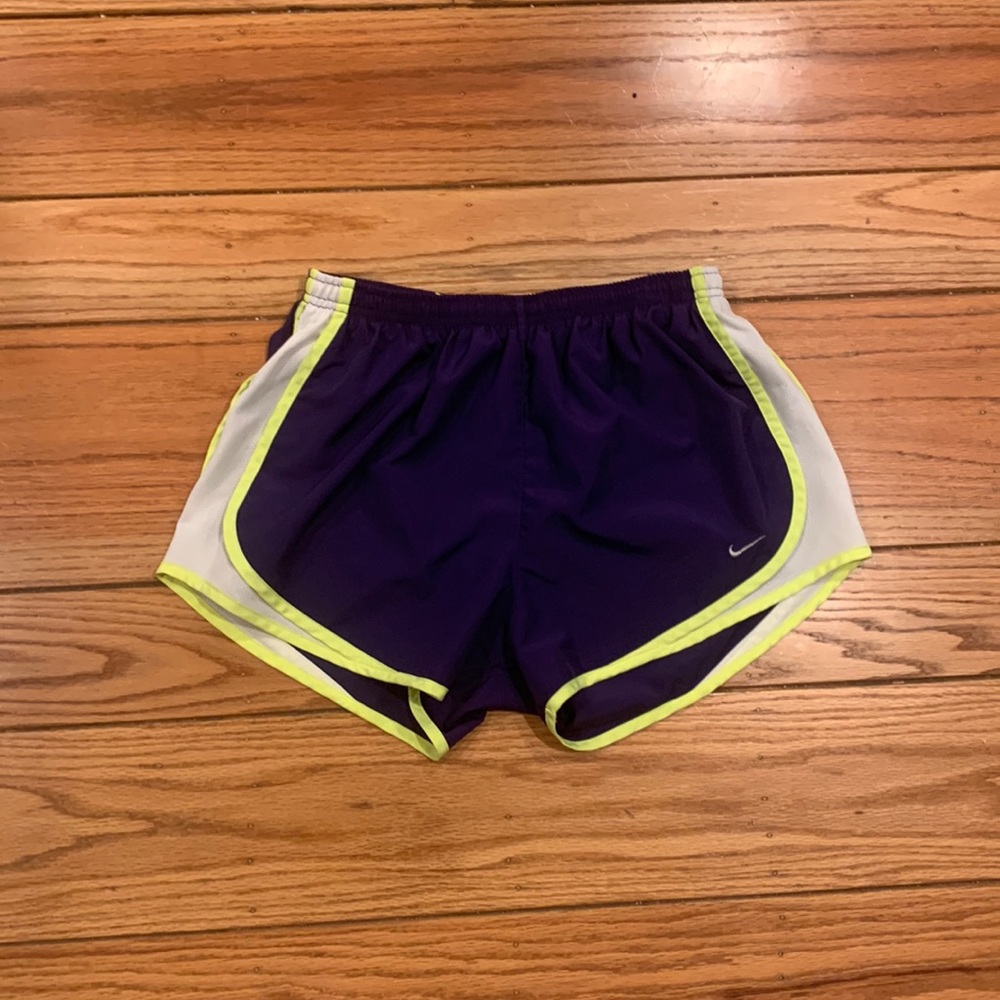 Loose Nike Dri-Fit Purple with Green shorts.